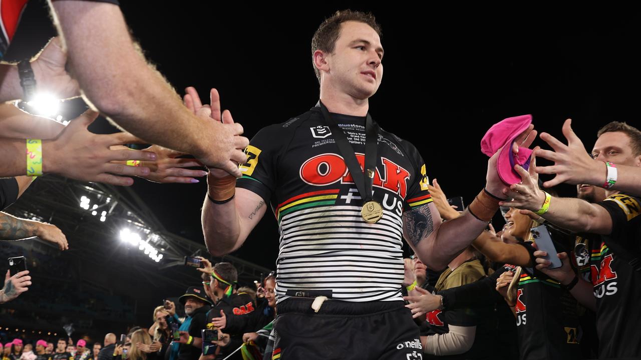 Panthers Players Lead Their Team Into The Stadium Background