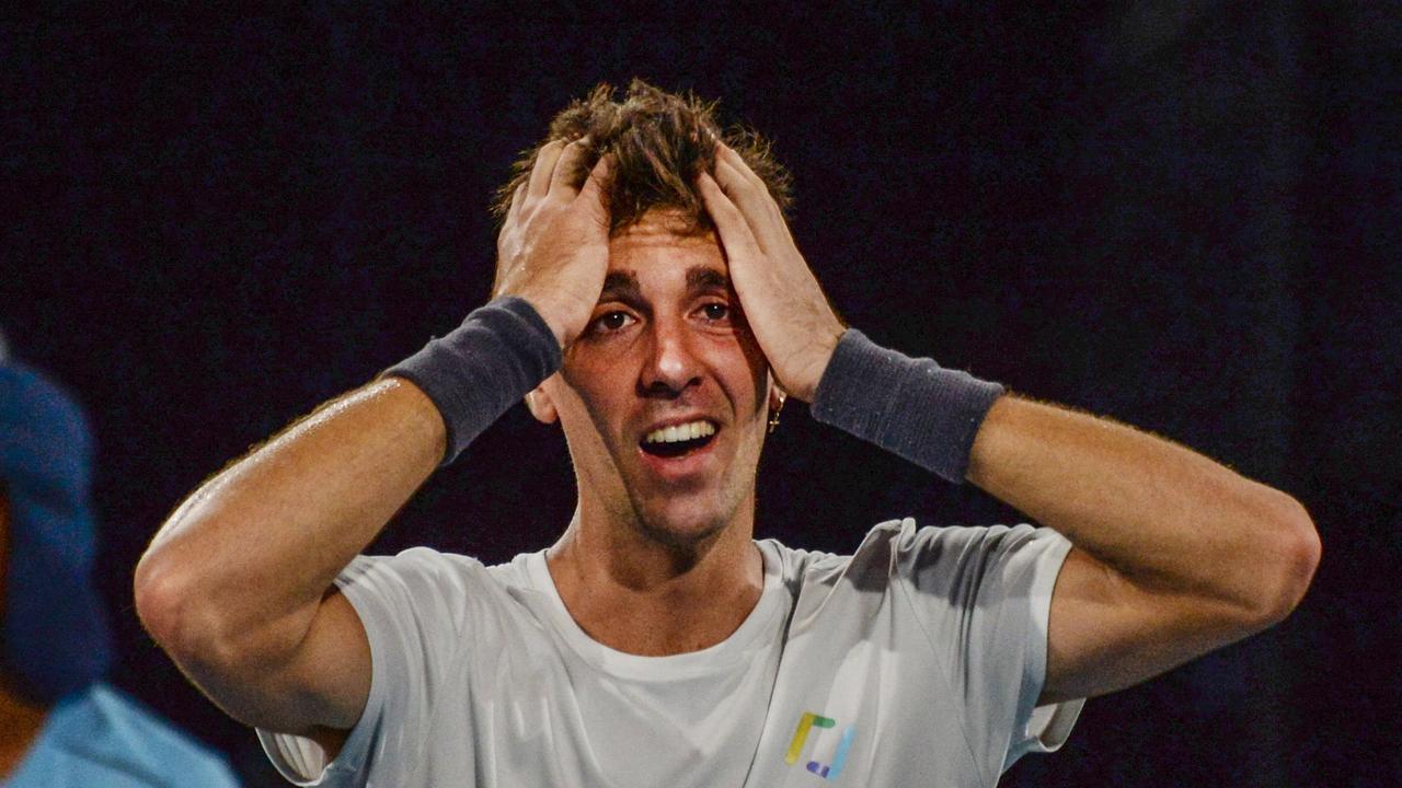 Thanasi Kokkinakis of Australia reacts after winning against Arthur Rinderknech of France in the men's singles final match at Adelaide International ATP 250 tennis tournament in Adelaide on January 15, 2022. (Photo by Brenton Edwards / AFP)