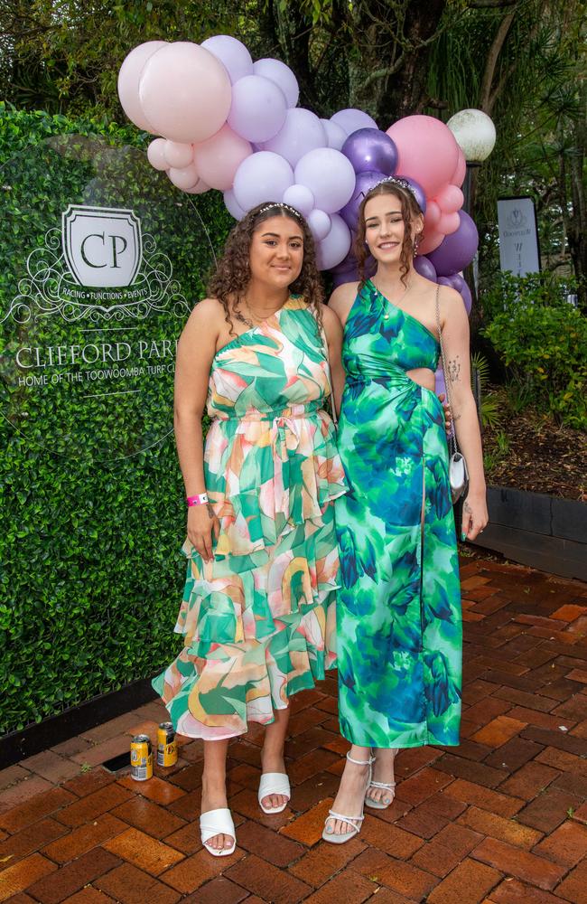 (From left) Alyrah Beezley and Taylor Schultz. Weetwood Raceday at Toowoomba Turf Club. Saturday, September 28, 2024. Picture: Nev Madsen.