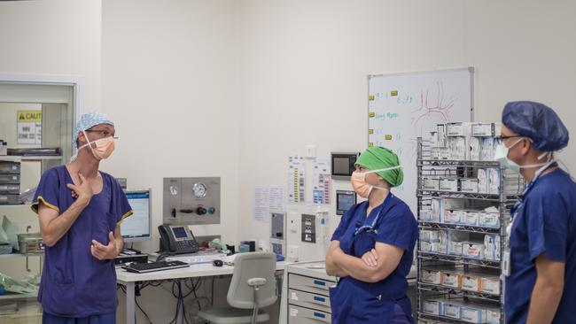 Cardiac Surgeon professor Yves d'Udekem explains the surgery to the team. Picture: Jason Edwards