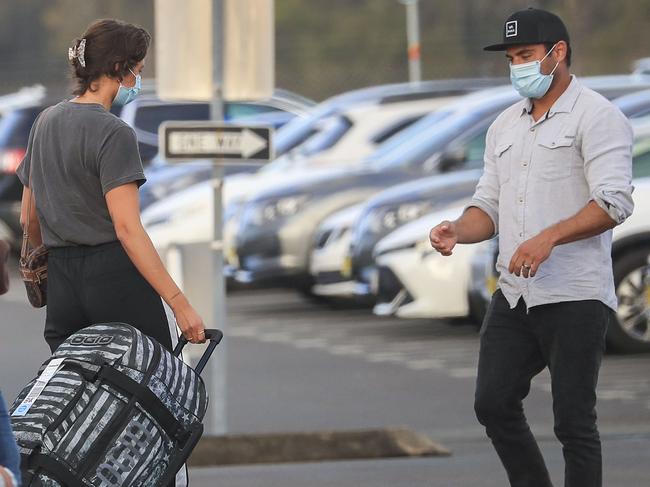 The couple both wore masks on their way back to Ballina. Picture: Media Mode