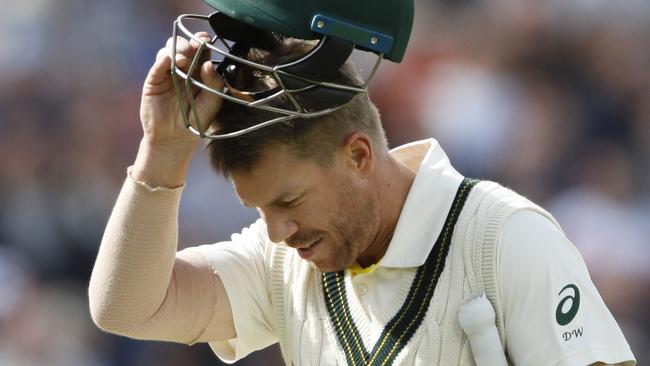 Australia's David Warner leaves the field after being dismissed during day four of the fourth Ashes Test cricket match between England and Australia at Old Trafford in Manchester, England, Saturday, Sept. 7, 2019. (AP Photo/Rui Vieira)