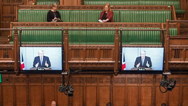 Boris Johnson is beamed in to the House of Commons on Monday. Picture: AFP