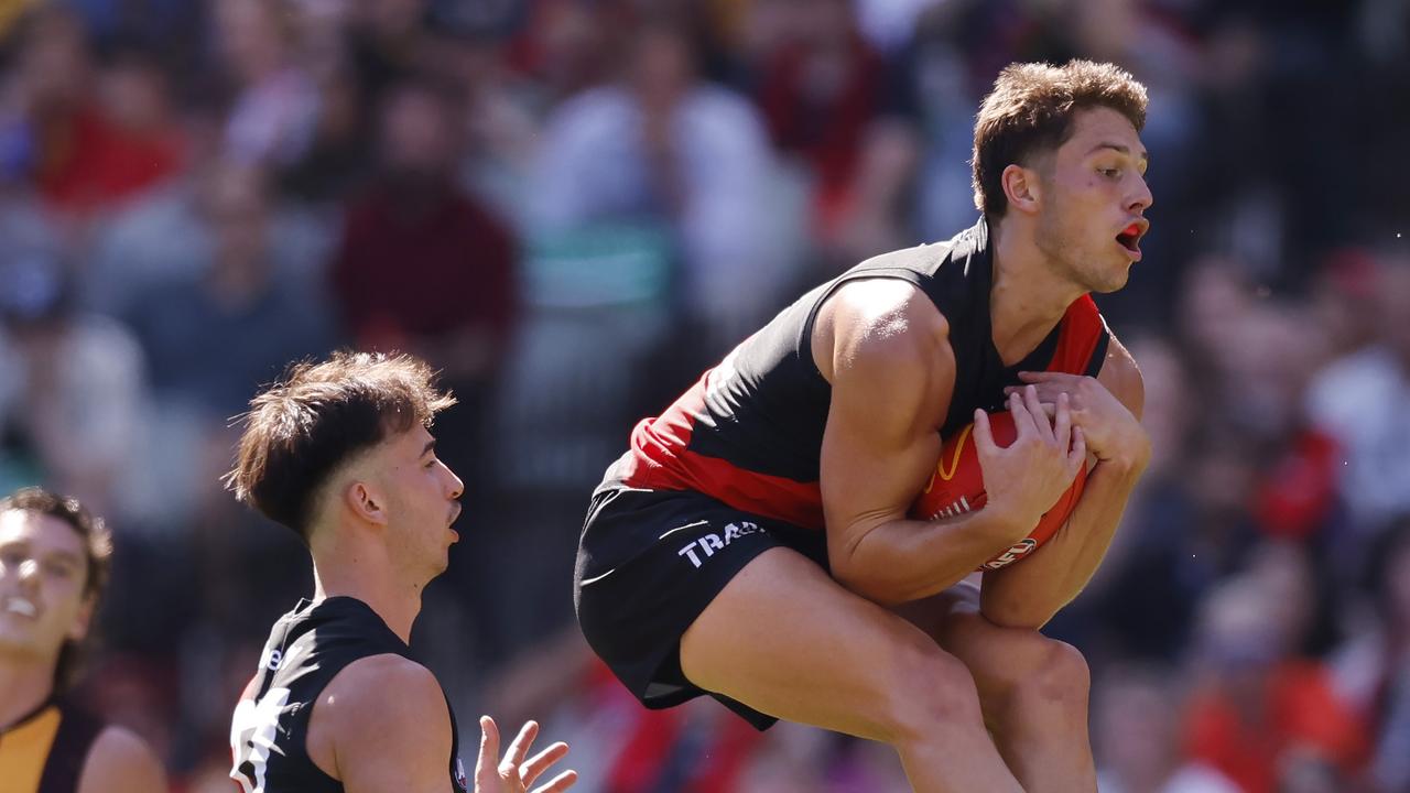 Archie Perkins of the Bombers marks on his chest during the 3rd qtr. Picture: Michael Klein