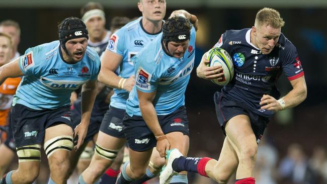 Reece Hodge about to score for the Rebels. Picture: AAP