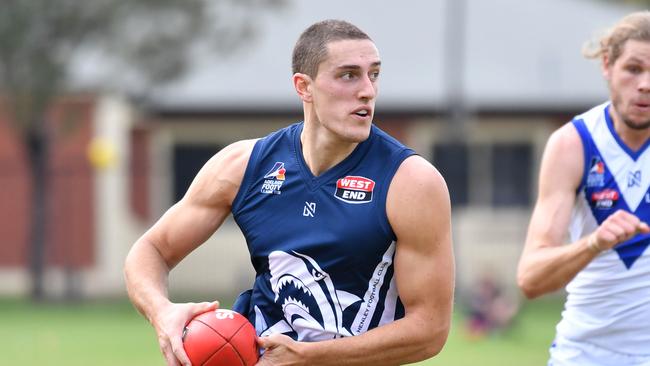 AMATEUR FOOTY: Henley (blue) v Athelstone (White)photograph at Henley Beach, Adelaide on Saturday the 26th of May 2018. H- Harris Jessen v A - Alex Davies (AAP/ Keryn Stevens)