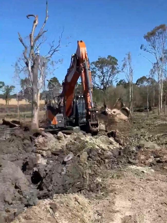 Roadworks on Sunday, September 1, 2024, at the site where a truck and ute collided two days earlier on the Bruce Highway near Daisy Dell Road, Bororen, resulting in an ammonium nitrate fire and one tank of ammonium nitrate exploding, leaving a crater in the ground and blasting parts of truck more than 1km away.