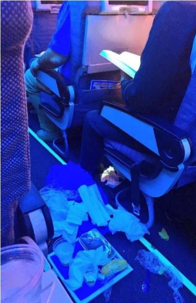 A man has been shamed online after another passenger photographed his disgusting behaviour after being served an in-flight meal on a flight.