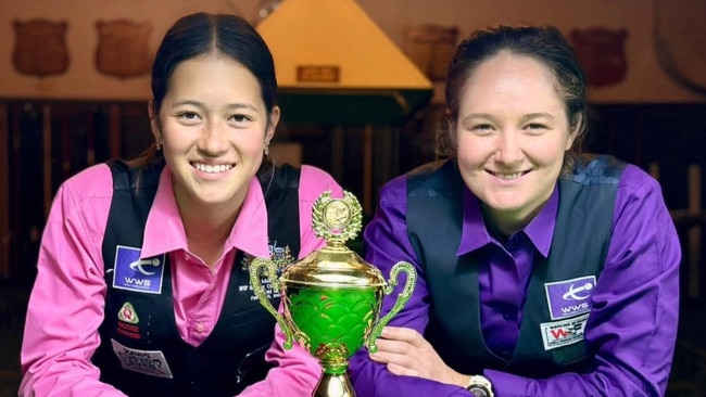 Lilly Meldrum (left) with her trophy after defeating reigning champion Jessica Woods (right). Picture: Australian Billiards &amp; Snooker Council/Facebook