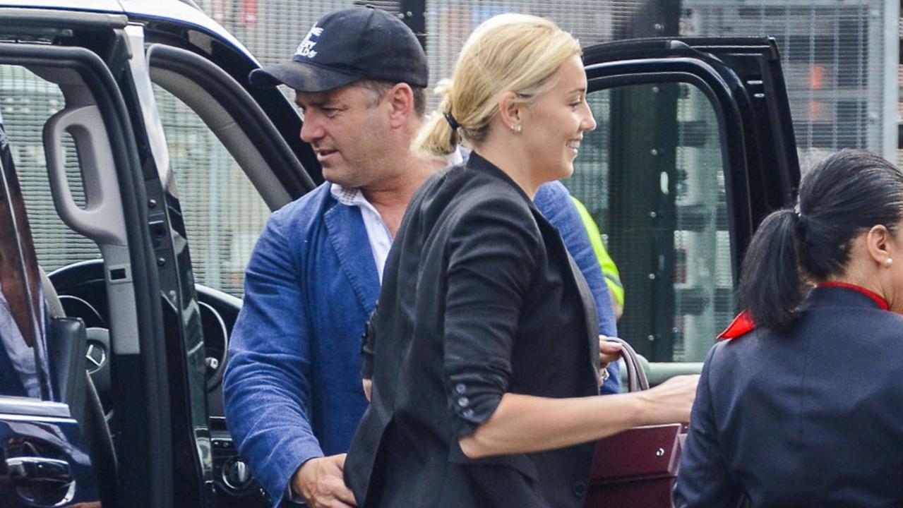 Karl Stefanovic and Jasmine Yarbrough arrive at Sydney airport to catch a flight to Mexico for their wedding next week. Picture: Media Mode