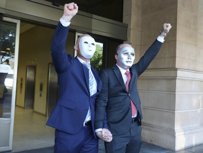 Brothers "A" and "B" leave the District Court following the sentencing of child sex offender Vivian Frederick Debo on Tuesday. Picture Dean Martin