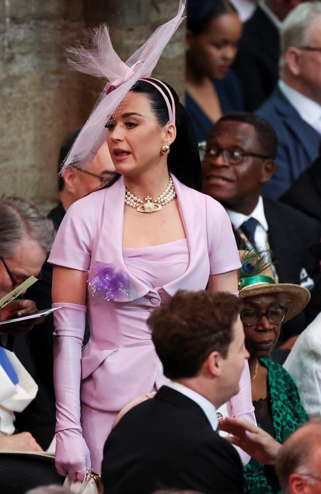 Looking for her seat while the whole world watches. Picture: Phil Noble - WPA Pool/Getty