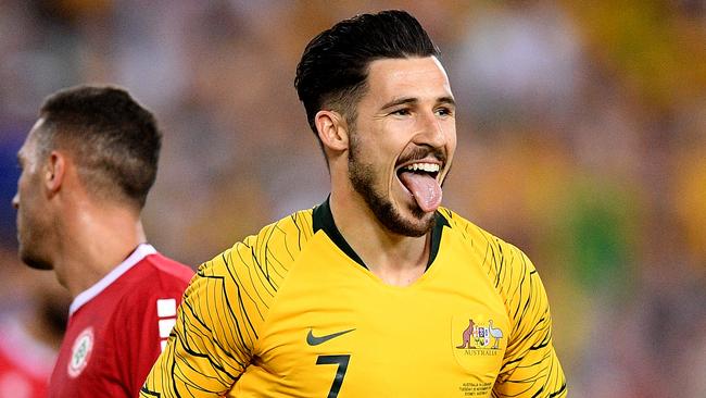 Mathew Leckie of the Socceroos celebrates after scoring a goal during the International friendly match between Australia and Lebanon at ANZ Stadium in Sydney, Tuesday, November 20, 2018. (AAP Image/Dan Himbrechts) NO ARCHIVING, EDITORIAL USE ONLY