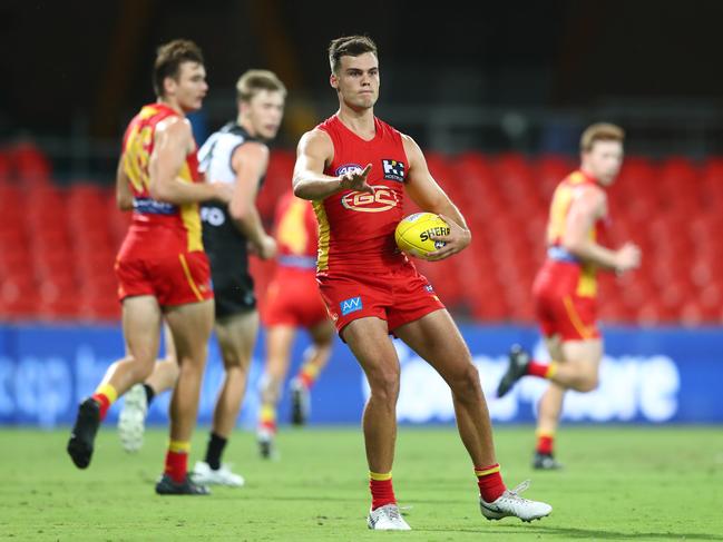 Jack Bowes of the Suns during the round 1 AFL match between the Gold Coast Suns and the Port Adelaide Power at Metricon Stadium on March 21, 2020 in Gold Coast, Australia. (Photo by Chris Hyde/Getty Images)