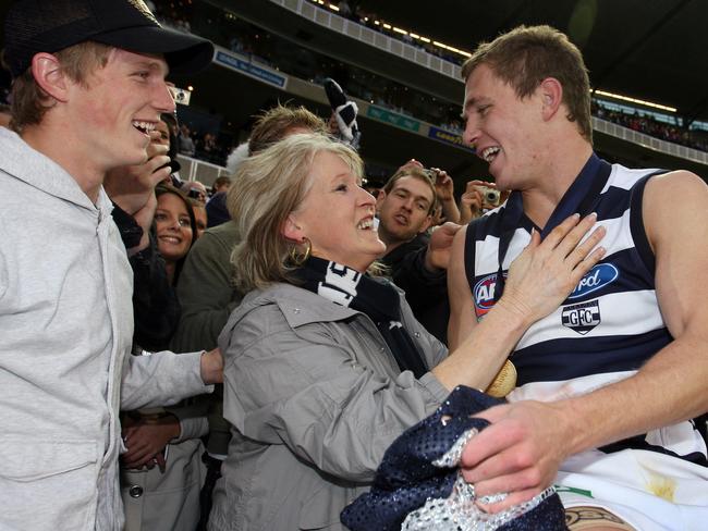 Joel Selwood greets his mum Maree and brother Scott after the 2007 Grand Final.