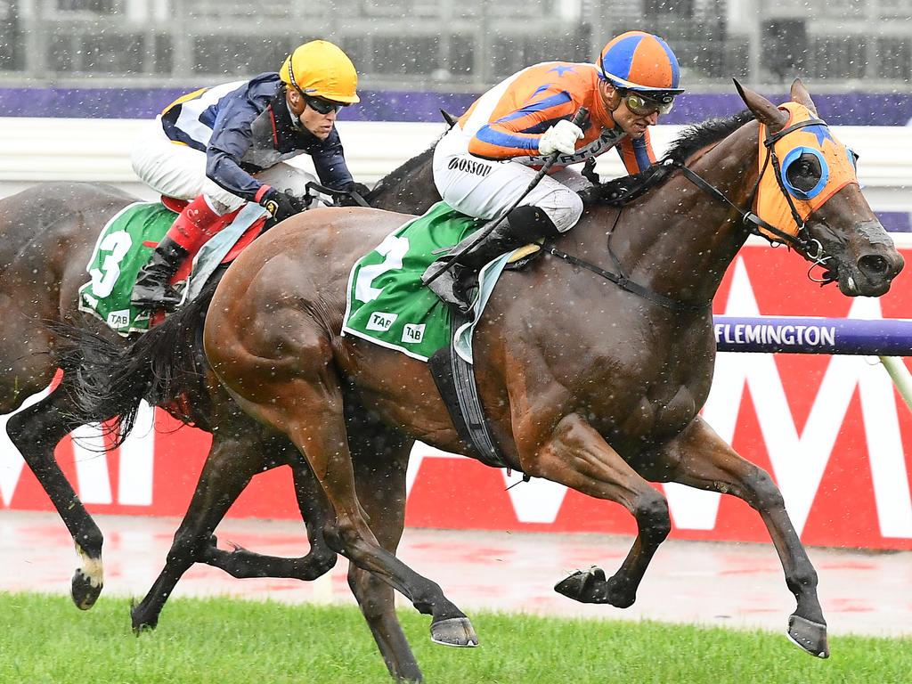 Opie Bosson and Melody Belle combine to win the Empire Rose Stakes at Flemington.