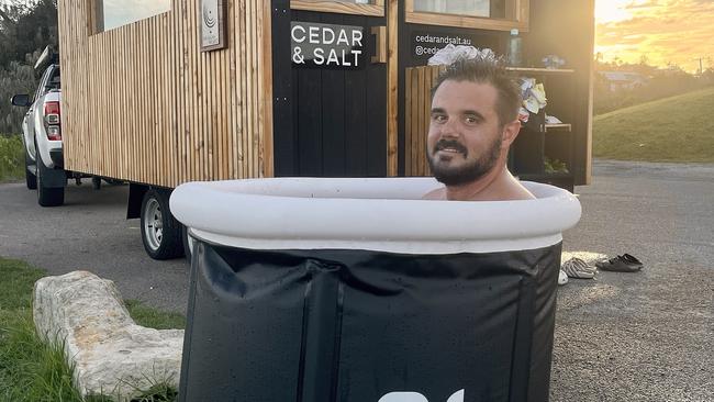 Mr Dempster-Smith, pictured outside his mobile sauna.