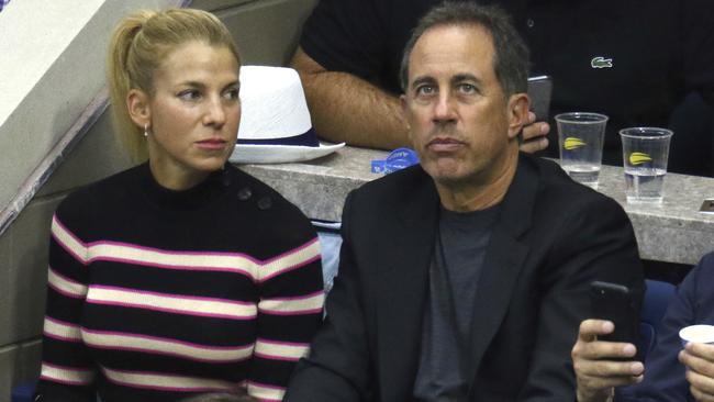 Jerry and Jessica Seinfeld take in the action. Picture: AP