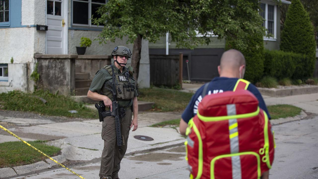 Police investigate outside the home of the mother of Robert Crimo. Picture: Jim Vondruska