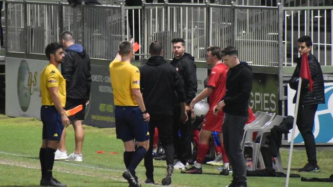 Redlands coach Richard Greer receives a red card against Magpies Crusaders. Picture: Matthew Forrest