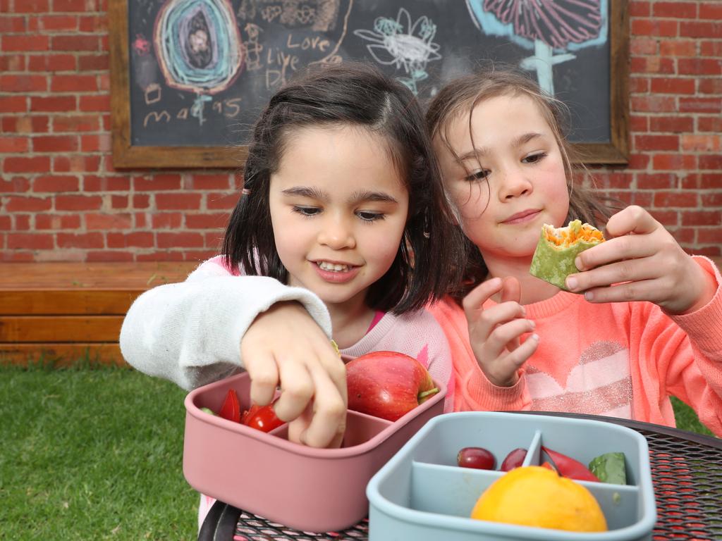 Primary kids on lunch box clock | KidsNews