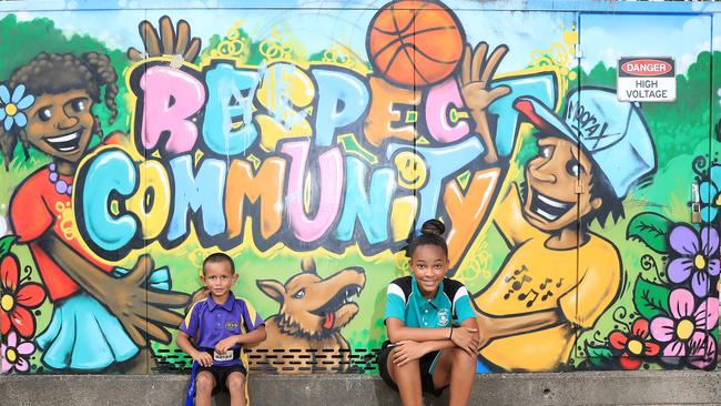 Neziah Kynuna and Jo-Nesha Daniels at Shang Park in Mooroobool, one of the most volatile voter suburbs in Leichhardt. Picture: Justin Brierty