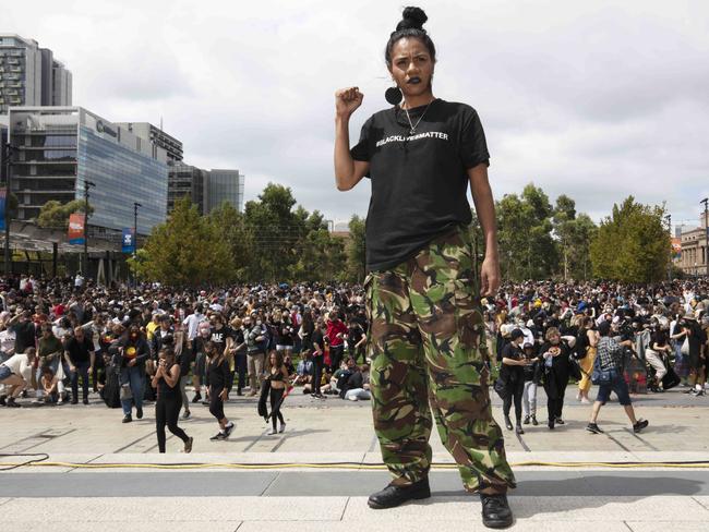 ADELAIDE, AUSTRALIA - NewsWire Photos JANUARY 26 Tuesday 2021: Australia Day 2021 - SURVIVAL DAYNatasha Wanganeen MCÃs events at AdelaideÃs Survival Day March at Victoria Square. The crowd marching down King William Street to Parliament House back to Victoria Square for speeches. Picture: NCA NewsWire / Emma Brasier.