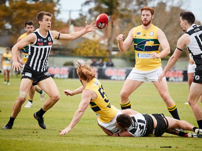 Jack Trengove intercepts Angus Poole's handball at Alberton Oval, in the match between Eagles and Port, Sunday, Aug. 11, 2019. Picture: MATT LOXTON