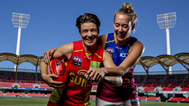 The Suns and Lions are going head to head on Saturday in the first AFLW Q-Clash. Suns Sam Virgo and Lions Lauren Arnell at Metricon Stadium, Picture: Jerad Williams