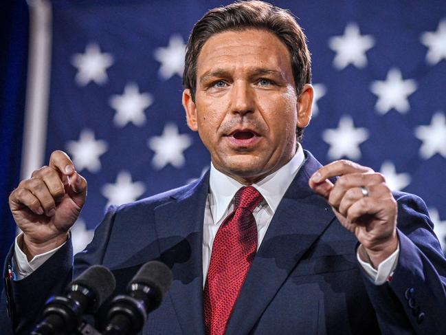 (FILES) In this file photo taken on November 8, 2022, Florida Governor Ron DeSantis speaks during an election night watch party at the Convention Center in Tampa, Florida. - Florida Governor Ron DeSantis has taken his most direct shots yet at rival Donald Trump, with the gloves finally coming off in what is widely expected to be the head-to-head for the 2024 Republican presidential nomination. (Photo by Giorgio VIERA / AFP)