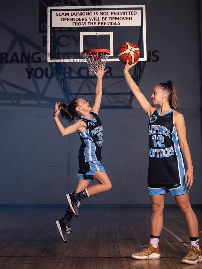 Gold Coast basketball rising star Lilly Rotunno with her little sister Layla who has just started her first season of rep basketball. Picture: Isaac Insoll