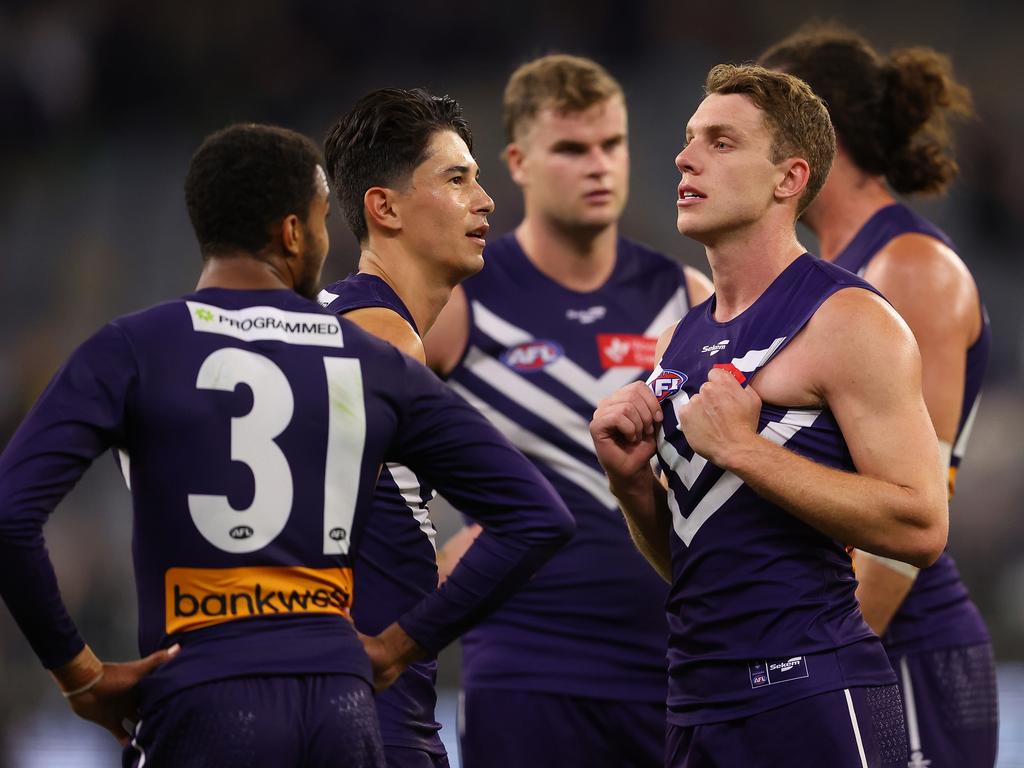 Josh Corbett with teammates after a loss in 2023. Picture: Paul Kane/Getty Images