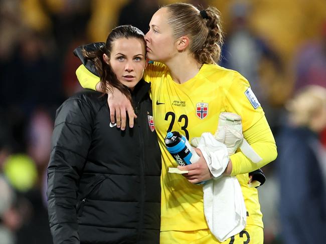 Aurora Mikalsen of Norway is consoled by goalkeeper Cecilie Fiskerstrand after the team's 1-3 defeat to Japan and elimination from the tournament. Picture: Catherine Ivill/Getty Images