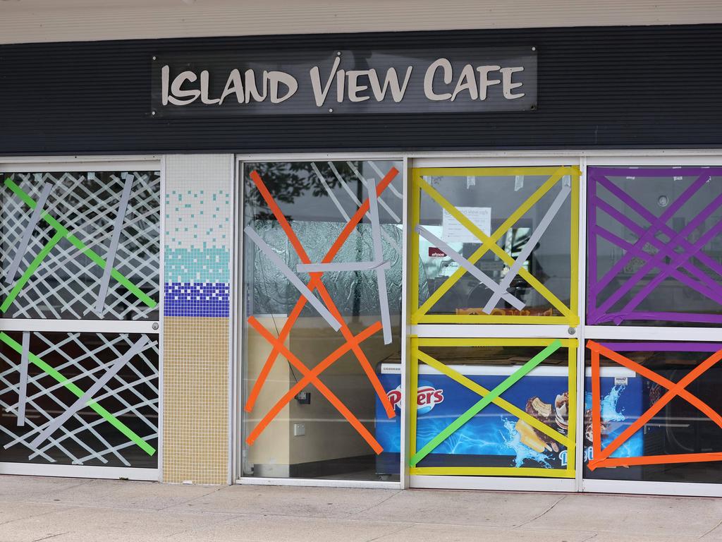 Business owners near the Port of Brisbane have taped up their windows ahead of the strong wings. Picture: NewsWire/Tertius Pickard