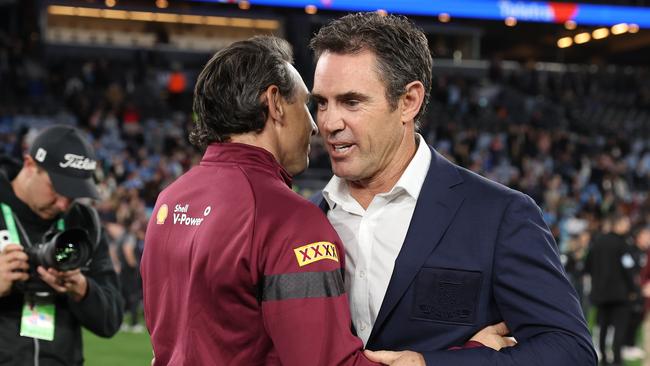 SYDNEY, AUSTRALIA – JULY 12: Maroons coach Billy Slater and Blues coach Brad Fittler embrace after game three of the State of Origin series between New South Wales Blues and Queensland Maroons at Accor Stadium on July 12, 2023 in Sydney, Australia. (Photo by Mark Kolbe/Getty Images)