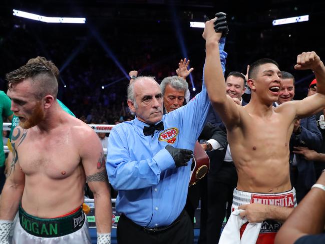 A clearly dejected Dennis Hogan after Jaime Munguia is announced as the winner in their title fight in Monterrey, Mexico. Picture: Getty Images