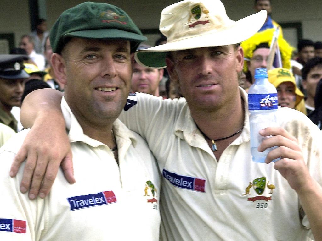 Darren Lehmann with Shane Warne after their team's victory on the fifth and final day of the final test match between Sri Lanka and Australia in Colombo, 28 March 2004. Picture: AFP