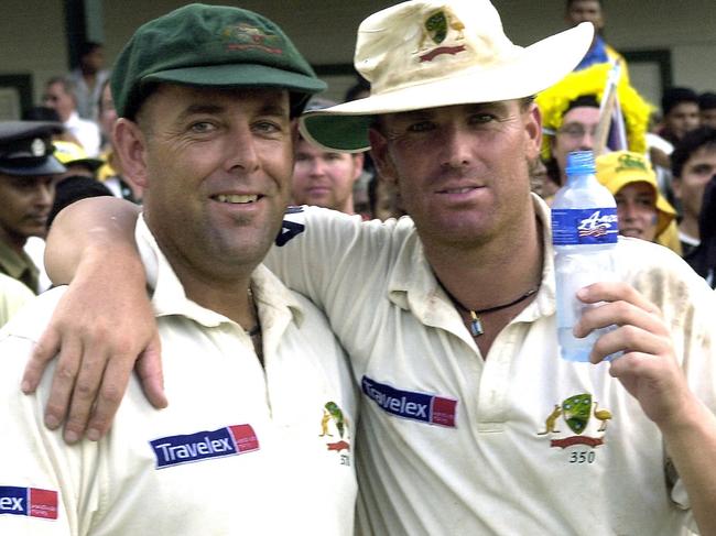 Darren Lehmann with Shane Warne after their team's victory on the fifth and final day of the final test match between Sri Lanka and Australia in Colombo, 28 March 2004. Picture: AFP