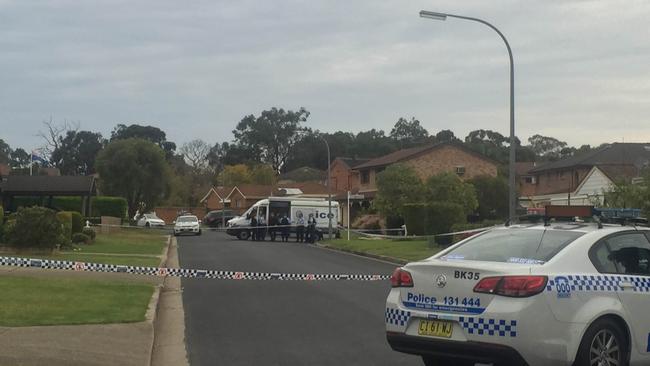 Police at the scene of a Links Ave, Milperra, home where the body of Anne Rogers was found. Her husband Warren Rogers had serious injuries and was in a critical condition in hospital. Picture: James Taylor