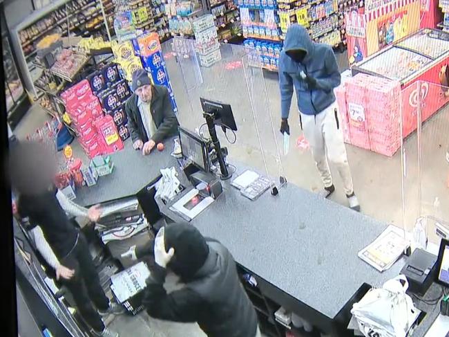 15/06/2024  CCTV footage of three men robbing an IGA  at knifepoint. in Cheltenham. source 9 news