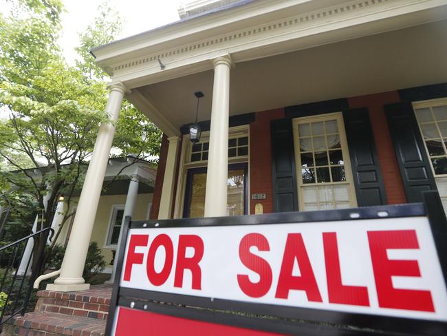 In this Aug. 16, 2019, photo a for sale signs beckon buyers to homes along Park Avenue in Richmond, Va. On Thursday, Aug. 22, Freddie Mac reports on this weekâ€™s average U.S. mortgage rates. (AP Photo/Steve Helber)