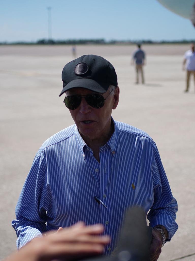 Joe Biden travelled to Florida on the same day to survey Hurricane damage. Picture: AFP