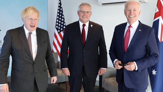 British PM Boris Johnson with Australian Prime Minister Scott Morrison and US President Joe Biden in June. Picture: Adam Taylor/PMO