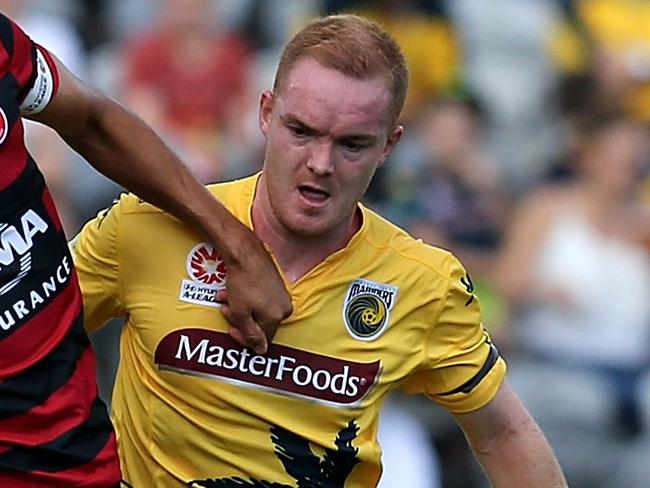 GOSFORD, AUSTRALIA - NOVEMBER 29: Nikolai Topor-Stanley of the Wanderers is contested by Daniel Heffernan of the Mariners during the round eight A-League match between the Central Coast Mariners and the Western Sydney Wanderers at Central Coast Stadium on November 29, 2015 in Gosford, Australia. (Photo by Ashley Feder/Getty Images)