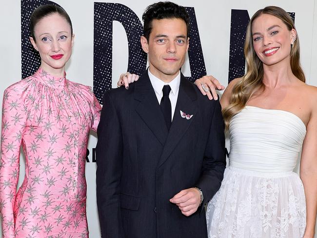 Co-stars Andrea Riseborough, Rami Malek and Margot Robbie. Picture: Theo Wargo/Getty Images for 20th Century Studios