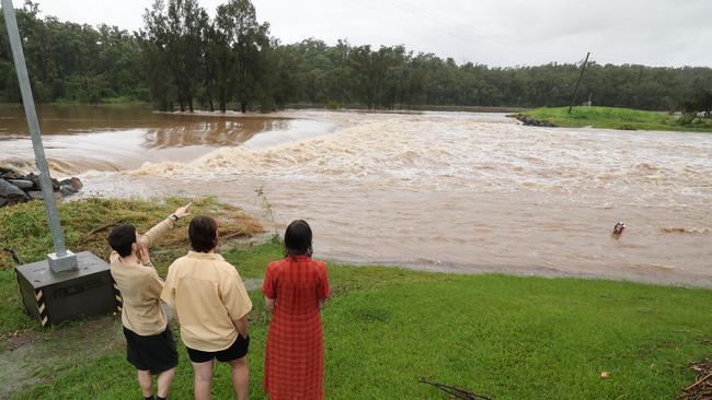 Flooding on the Gold coast in the aftermath of Cyclone Alfred. Oxenford Weir. Picture Glenn Hampson