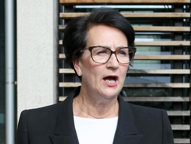 Attorney-General Vickie Chapman speaks to the media on the introduction of a bill to compensate victims of institutional child sex abuse at Parliament house in Adelaide, Wednesday, July 25, 2018. (AAP Image/Kelly Barnes) NO ARCHIVING