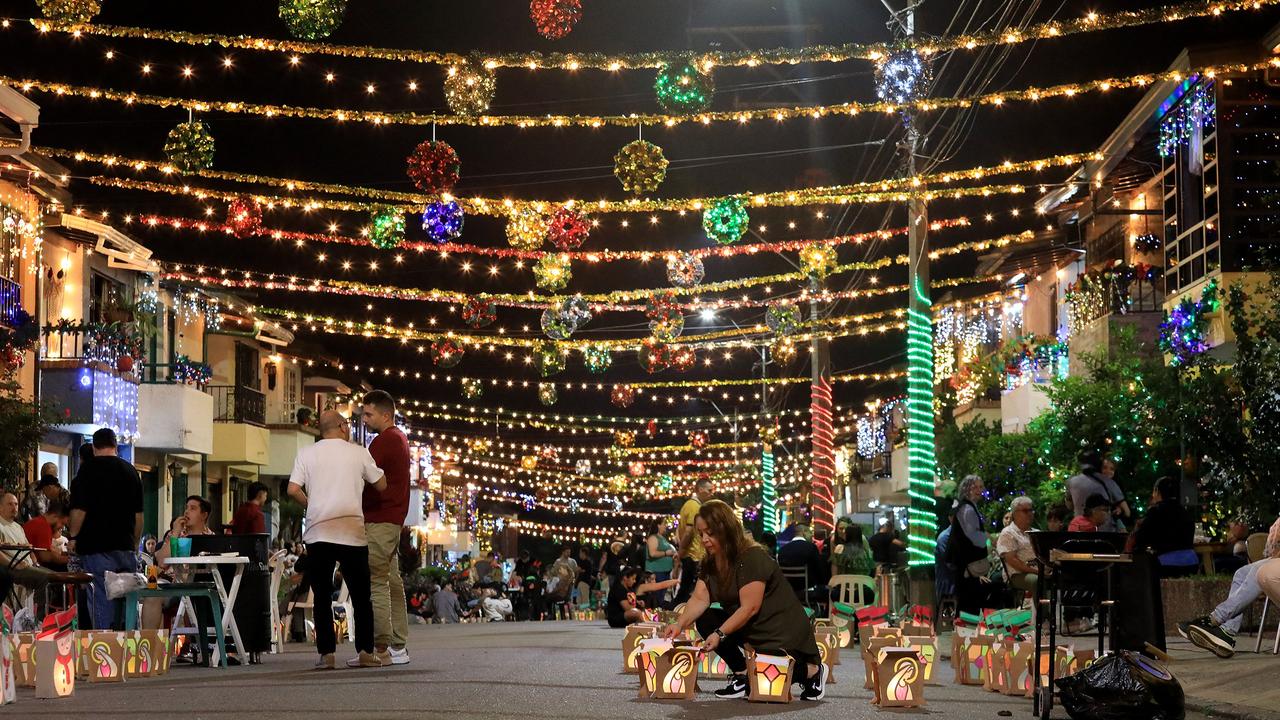 The Day of the Little Candles is a traditional Colombian celebration of the Immaculate Conception of the Virgin Mary, marking the beginning of the Christmas season. Picture: Jaime Saldarriaga/AFP