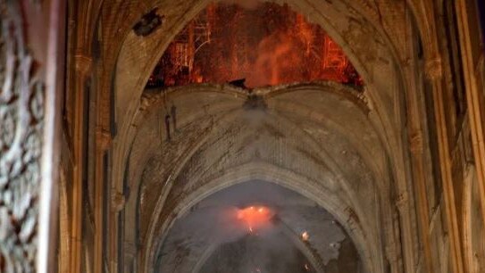 The cathedral roof is engulfed. Picture: AP.