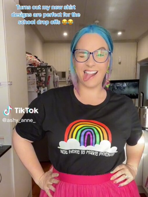 Ashy Anne has released her own merchandise with a range of funny and NSFW quotes often referred to in her videos. Picture: TikTok / @ashy_anne_